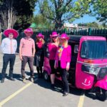 Pink tuk tuk and Rosie May Foundation team during Rosie May Day charity event